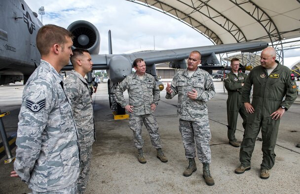 U.S. Air Force Chief Master Sgt. Thomas Brandhuber, 10th Air Force command chief, talks with Airmen and leadership from the 476th Maintenance Squadron, Aug. 6, 2016, at Moody Air Force Base, Ga. The 476th Fighter Group stood up in 2009, under the command of the 10th Air Force, and brought Total Force integration to Moody with 476th citizen Airmen flying and maintaining the 23d Wing’s A-10C Thunderbolt II aircraft.  (U.S. Air Force photo by Airman 1st Class Janiqua P. Robinson)
