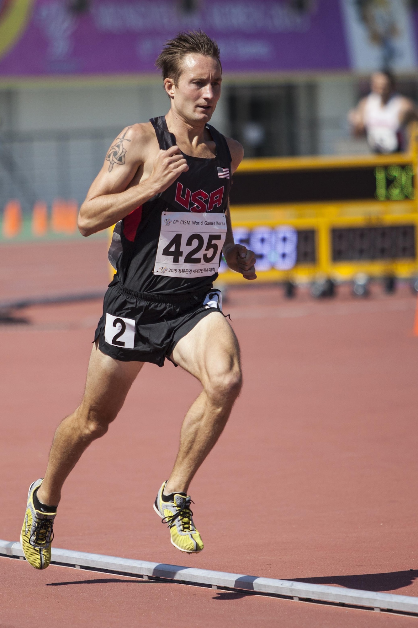 Capt. Daniel Castle, KC-135 Stratotanker pilot, runs a 1500-meter race at the 2015 Military World Military Games in Mungyeong, South Korea, October 8, 2015. Castle earned ninth place in the 1500-meter race and continued training for the Olympic Trials. (U.S. Marine Corps photo/Cpl. Jordan E. Gilbert)