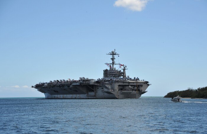 Nimitz-class aircraft carrier USS John C. Stennis departs Joint Base Pearl Harbor-Hickam following the conclusion of Rim of the Pacific 2016. Twenty-six nations, more than 40 ships and submarines, more than 200 aircraft and 25,000 personnel participated in RIMPAC from June 30 to Aug. 4, in and around the Hawaiian Islands and Southern California. The world's largest international maritime exercise, RIMPAC provides a unique training opportunity that helps participants foster and sustain the cooperative relationships that are critical to ensuring the safety of sea lanes and security on the world's oceans. RIMPAC 2016 is the 25th exercise in the series that began in 1971. 