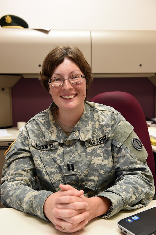 Army Reserve Capt. Jessica Herdrich, Trial Counsel, 85th Support Command, pauses for a photo during a battle assembly at the 85th Support Command. Herdrich is preparing for a yearlong deployment to Kuwait on a legal assistance mission to assist soldiers in the theater of operations.
(U.S. Army photo by Spc. David Lietz/Released)