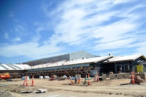 Contractors work on a building, August 3, 2016, at McConnell Air Force Base, Kan. The building will be the home of the Regional Maintenance Training Facility, which is where KC-46 Pegasus crew chiefs will be trained. (U.S. Air Force photo/Airman Erin McClellan)