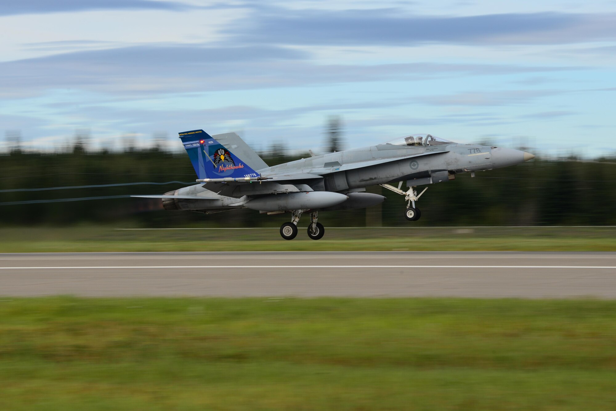 A Royal Canadian Air Force CF-18 Hornet assigned to the 409th Tactical Fighter Squadron, Canadian Forces Base Cold Lake, Alberta, takes off for a morning sortie from the Eielson Air Force Base, Alaska, flight line Aug. 8, 2016, during RED FLAG-Alaska (RF-A) 16-3. This Pacific Air Forces commander-directed exercise is vital to maintaining peace and stability in the Indo-Asia-Pacific region. (U.S. Air Force photo by Airman 1st Class Cassandra Whitman)