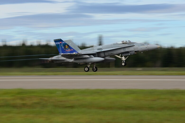 A Royal Canadian Air Force CF-18 Hornet assigned to the 409th Tactical Fighter Squadron, Canadian Forces Base Cold Lake, Alberta, takes off for a morning sortie from the Eielson Air Force Base, Alaska, flight line Aug. 8, 2016, during RED FLAG-Alaska (RF-A) 16-3. This Pacific Air Forces commander-directed exercise is vital to maintaining peace and stability in the Indo-Asia-Pacific region. (U.S. Air Force photo by Airman 1st Class Cassandra Whitman)
