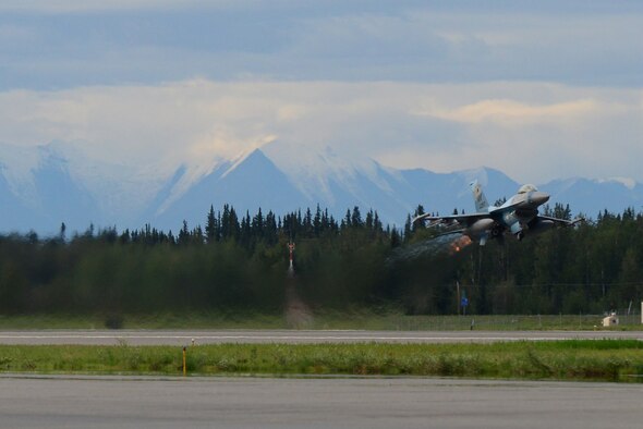 A U.S. Air Force F-16 Fighting Falcon aircraft assigned to the 18th Aggressor Squadron, takes off from Eielson Air Force Base, Alaska, for a mission Aug. 8, 2016, during RED FLAG-Alaska (RF-A) 16-3. RF-A enables joint and international units to sharpen their combat skills by flying simulated combat sorties in a realistic threat environment, which allows them to exchange tactics, techniques and procedures while improving interoperability. (U.S. Air Force photo by Airman 1st Class Cassandra Whitman)
