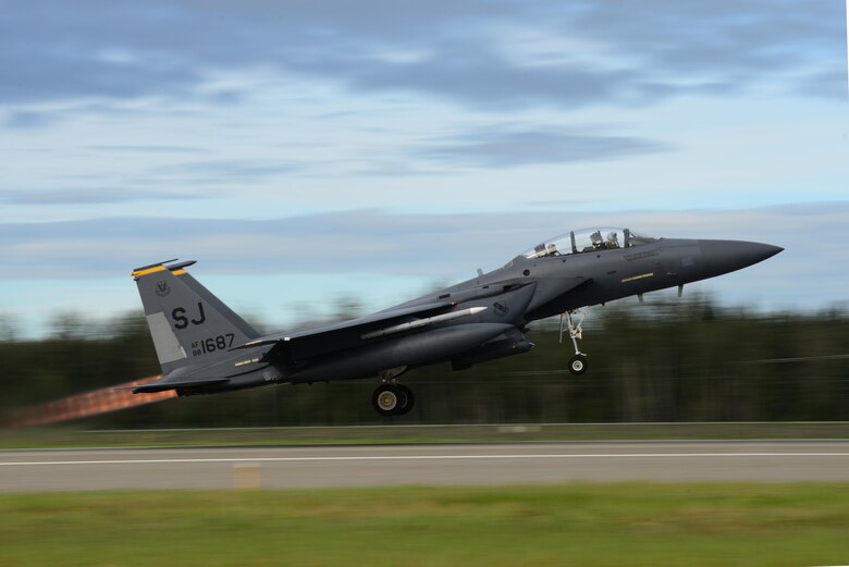 A U.S. Air Force F-15E Strike Eagle dual-role fighter aircraft assigned to the 336th Fighter Squadron out of Seymour Johnson Air Force Base, N.C., takes off from the Eielson Air Force Base, Alaska, flight line Aug. 8, 2016, during RED FLAG-Alaska 16-3. This exercise provides unique opportunities to integrate various forces into joint, coalition and multilateral training from simulated forward operating bases. (U.S. Air Force photo by Airman 1st Class Cassandra Whitman)