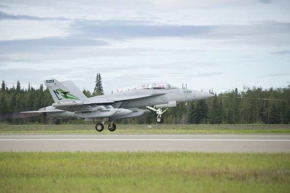 A U.S. Navy EA-18G Growler aircraft assigned to Electronic Attack Squadron 135, Naval Air Station Whidbey Island, Wash., takes off from Eielson Air Force Base, Alaska, for a morning sortie Aug., 8, 2016, during RED FLAG-Alaska 16-3. This exercise provides unique opportunities to integrate various forces into joint, coalition and multilateral training from simulated forward operating bases. (U.S. Air Force photo by Airman Isaac Johnson)