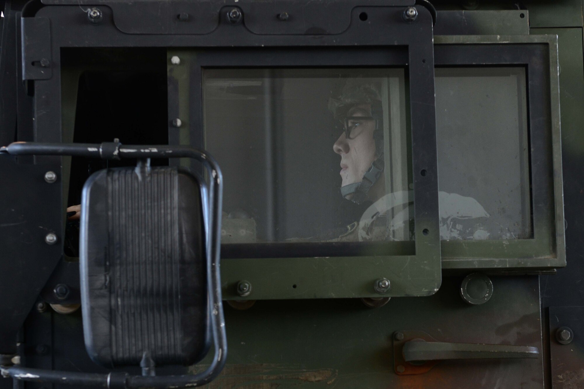Pvt. Brandon Arnett, A Battery, 2nd Battalion, 377th Parachute Field Artillery Regiment cannon crewmember, drives a High Mobility Multipurpose Wheeled Vehicle at Joint Base Elmendorf-Richardson, Alaska, August 3, 2016. USARAK is home to the Army’s only Pacific airborne brigade combat team, and maintains the only airborne rapid-response capacity within the Pacific Command area of responsibility. (U.S. Air Force photo by Airman 1st Class Javier Alvarez)