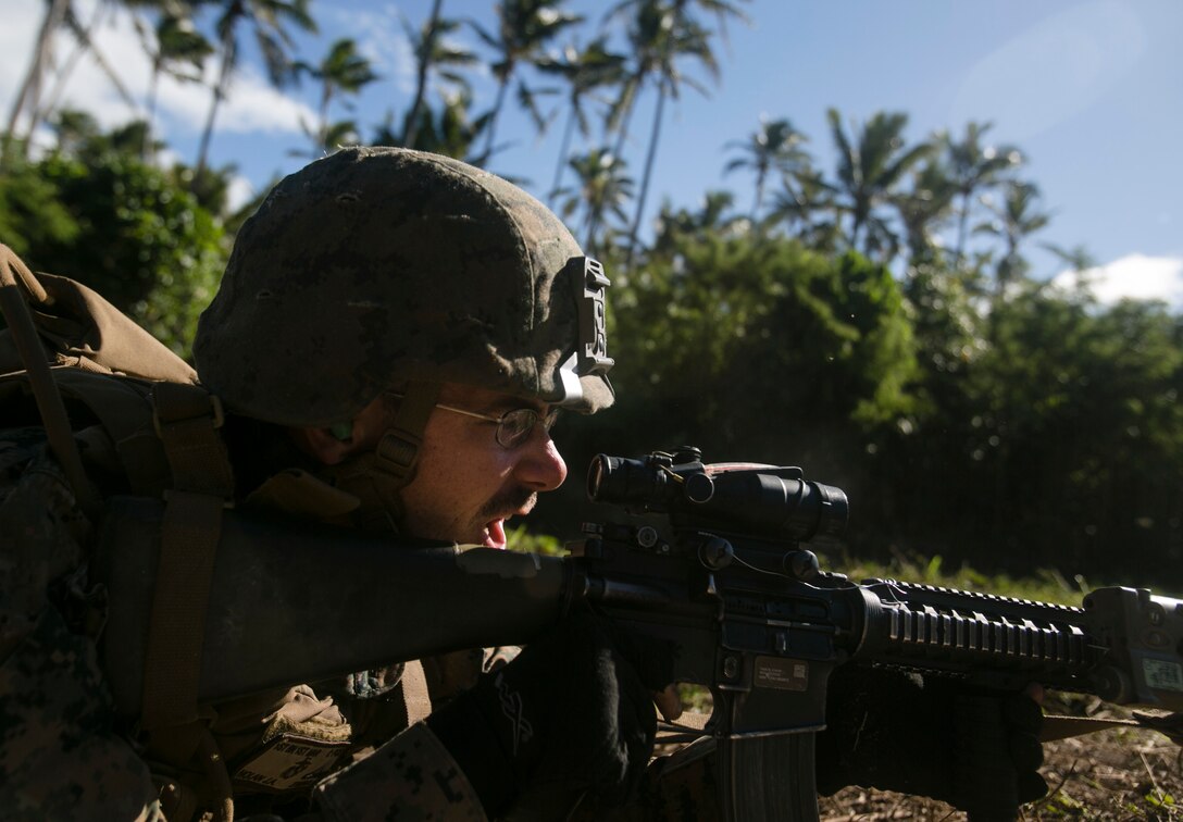Lance Cpl. Jake A. Nolan shouts commands as a fire-team leader during a live-fire range, July 27, 2016, on Motutapu Island, Tonga, as part of a multi-national, bilateral exercise, between U.S. and Tongan forces, designed to increase interoperability and relations. The service members combined and applied skills practiced during the exercise in a culminating range such as demolition, high explosive exploitation, beach insertion and buddy rushing. Nolan, from Concord, North Carolina, is an infantryman with Task Force Koa Moana and is originally assigned to Company A, 1st Battalion, 1st Marine Regiment, 1st Marine Division, I Marine Expeditionary Force. (U.S. Marine Corps photo by Sgt. William Hester/ Released)
