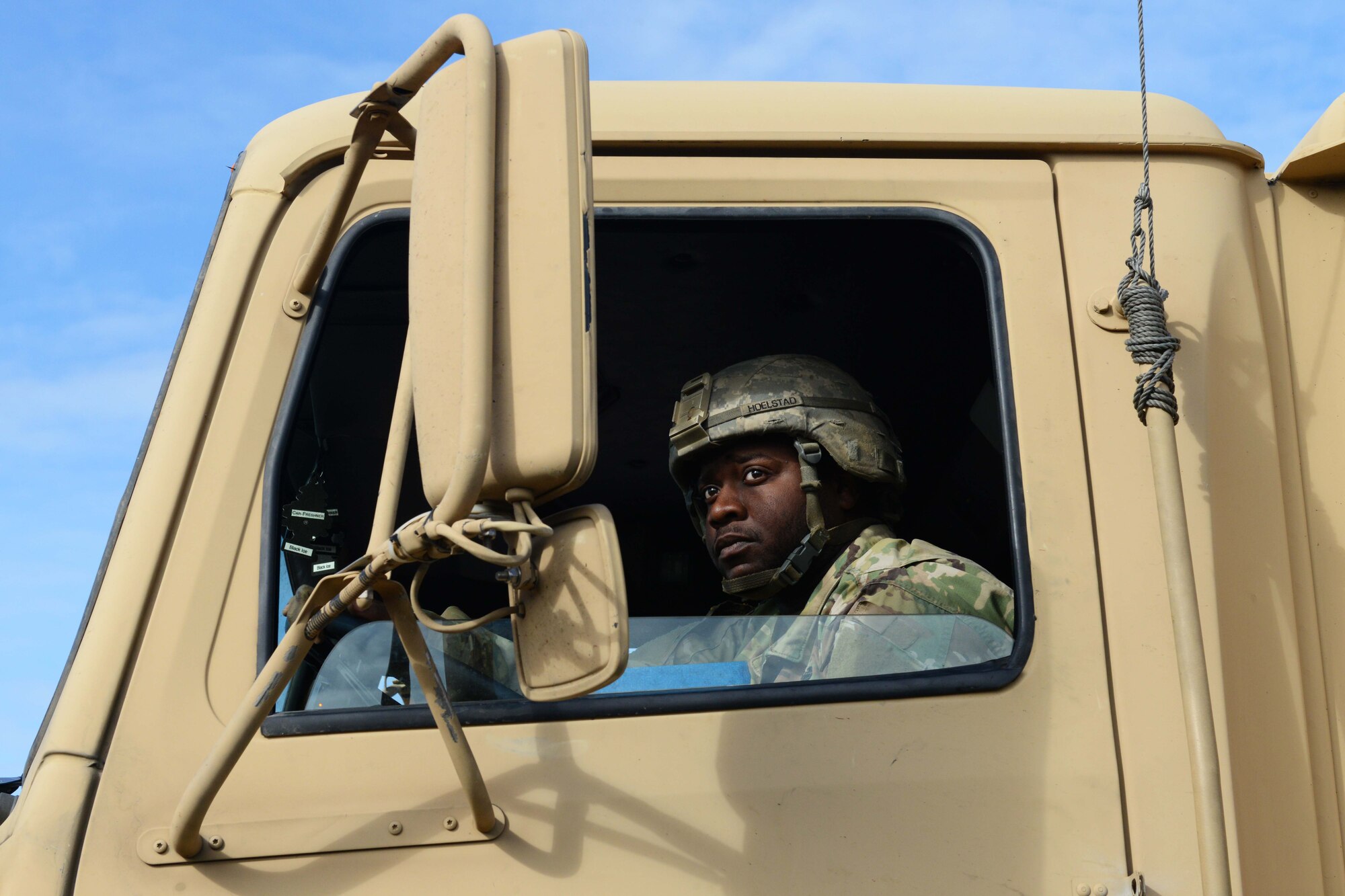 A U.S. Army Soldier with the 539th Composite Truck Company from Fort Wainwright, Alaska, backs drives an M915A5 Line-Haul Tractor Truck in reverse at Joint Base Elmendorf-Richardson, Alaska, August 3, 2016. The M915A5s are deployed by U.S. Army, Army Reserve units and National Guard. It tows the Army's fleet of semi-trailers and fuel tankers. (U.S Air Force photo by Airman 1st Class Javier Alvarez)