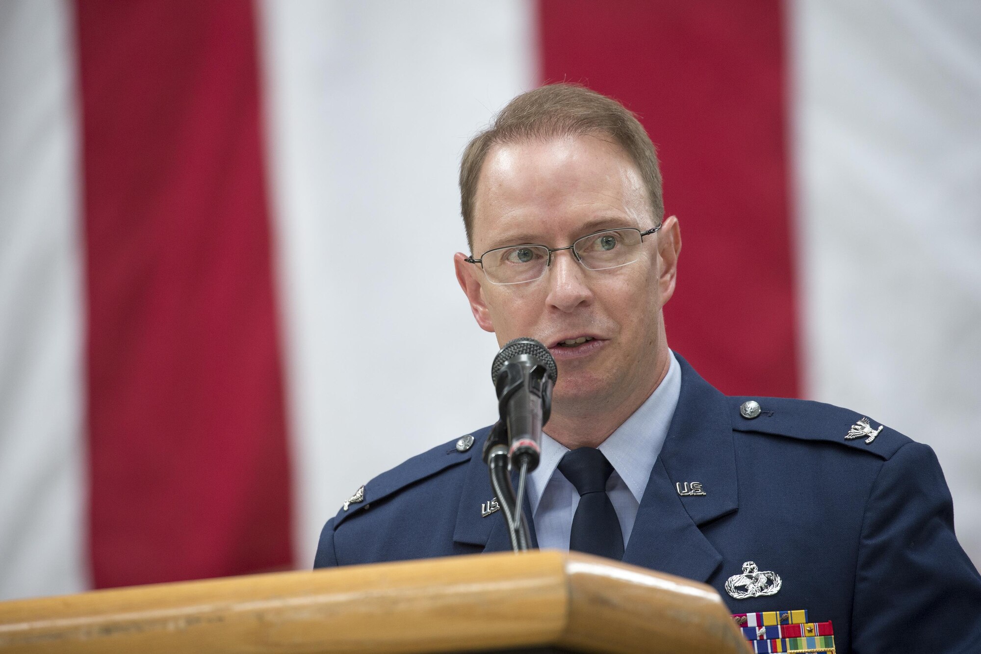 Col. John Winkler, 374th Mission Support Group commander, gives a speech during the 374th MSG change of command ceremony at Yokota Air Base, Japan, Aug. 8. 2016. Prior to taking command, Winkler was the deputy commander for the 319th Mission Support Group, Grand Forks Air Force Base, North Dakota. The change of command ceremony is a symbolic gesture to officially transfer the responsibility between the outgoing and incoming commander. (U.S. Air Force photo by Yasuo Osakabe/Released)