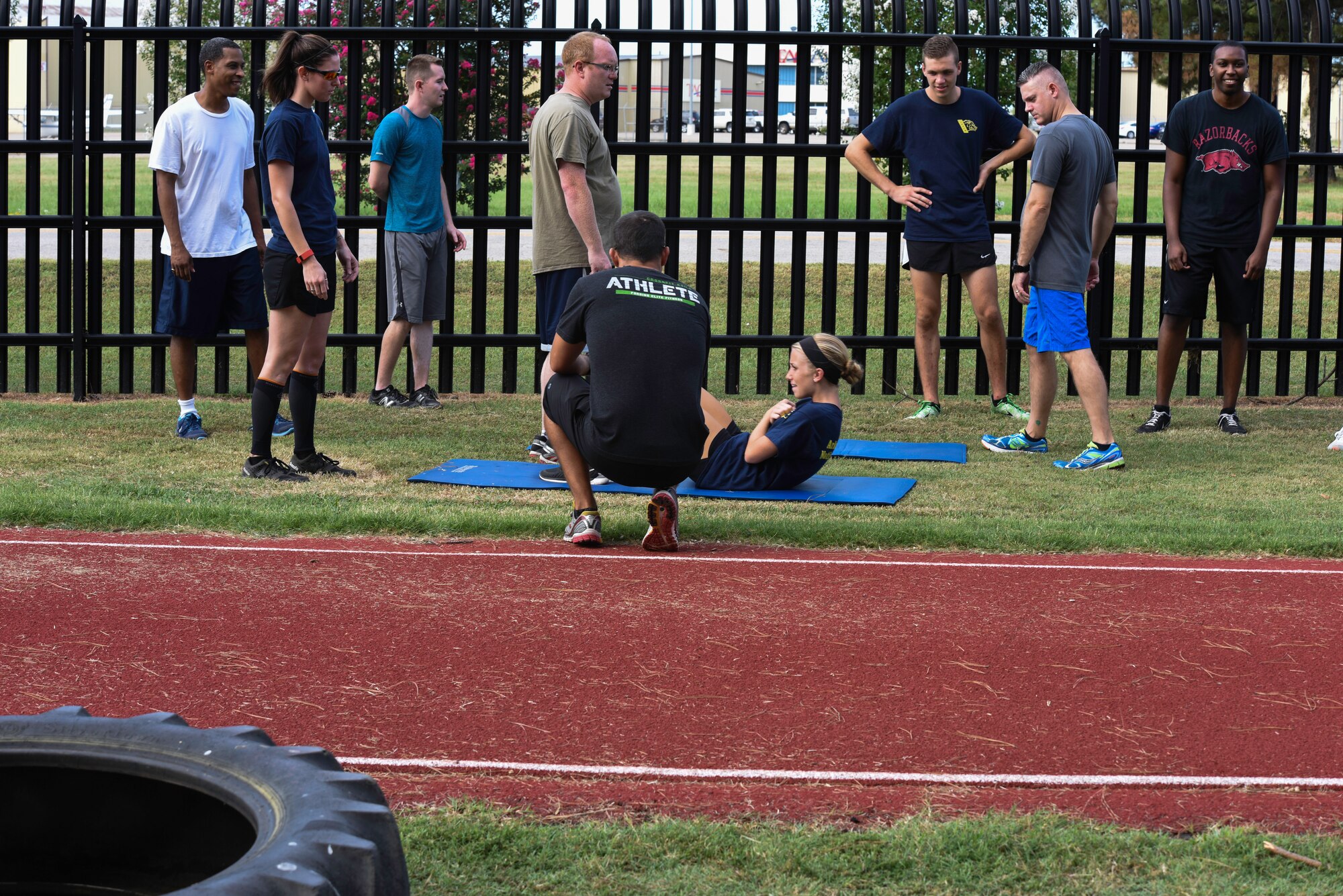 Members of the 188th Wing participate in the Wingman Olympics August 8, 2016, at Ebbing Air National Guard Base, Fort Smith, Ark. The Wingman Olympics is an event dedicated to promoting resiliency, team building and esprit de corps and encourages physical, spiritual and emotional well-being through team events and activities. This year’s Wingman Olympics included a 1.5 mile run, a casting contest, free throw contest, horseshoes and bean bag toss, a 1 mile sprint relay and a volleyball tournament. (U.S. Air National Guard photo by Capt. Holli Nelson)