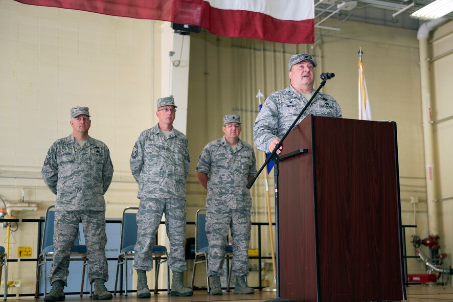 U.S. Air Force Col. Barton Welker, the outgoing commander of the 182nd Maintenance Group, Illinois Air National Guard, addresses the 182nd Airlift Wing following a change of command ceremony in Peoria, Ill., Aug. 6, 2016. Welker gave command of the group to Col. Timothy Stumbaugh. (U.S. Air National Guard photo by Staff Sgt. Lealan Buehrer)