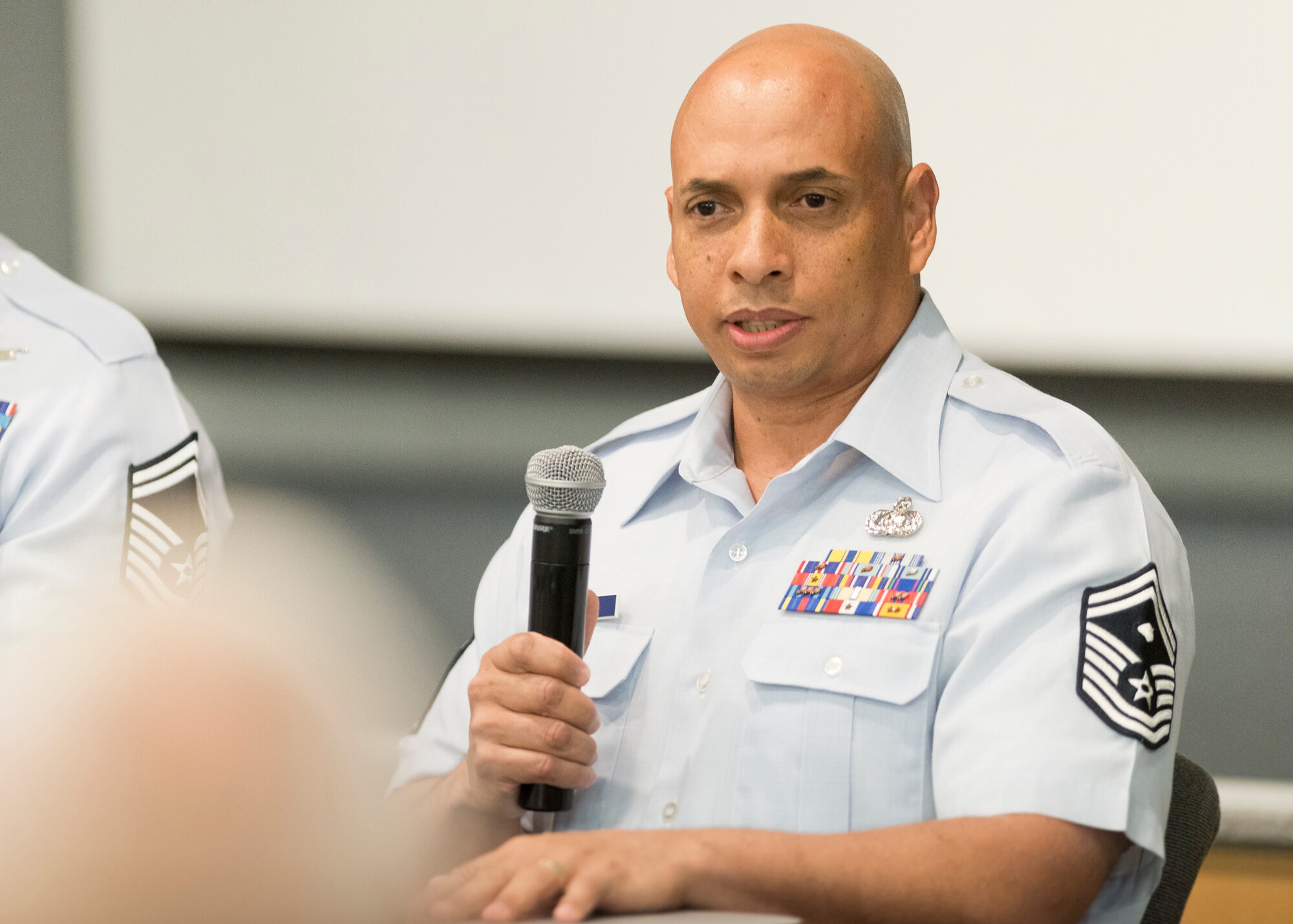 Senior Master Sgt. Jack N. Minaya, first sergeant with the 214th Reconnaissance Squadron, Arizona Air National Guard, and the ANG Outstanding First Sergeant of the Year, gives remarks during the Focus on the Force Week’s “Outstanding Airmen of the Year Panel.” Focus on the Force Week is a series of events highlighting the importance of professional development for Airmen at all levels, and the recognition of accomplishments throughout the enlisted corps. The OAY winners are Staff Sgt. Jennifer D. Masters, Airman of the Year; Tech. Sgt. Nicholas Jewell, Non-Commissioned Officer of the Year; Senior Master Sgt. Mark Farmer, Senior Non-Commissioned Officer of the Year; and Senior Master Sgt. Jack Minaya, First Sergeant of the Year. (U.S. Air National Guard photo by Master Sgt. Marvin R. Preston)