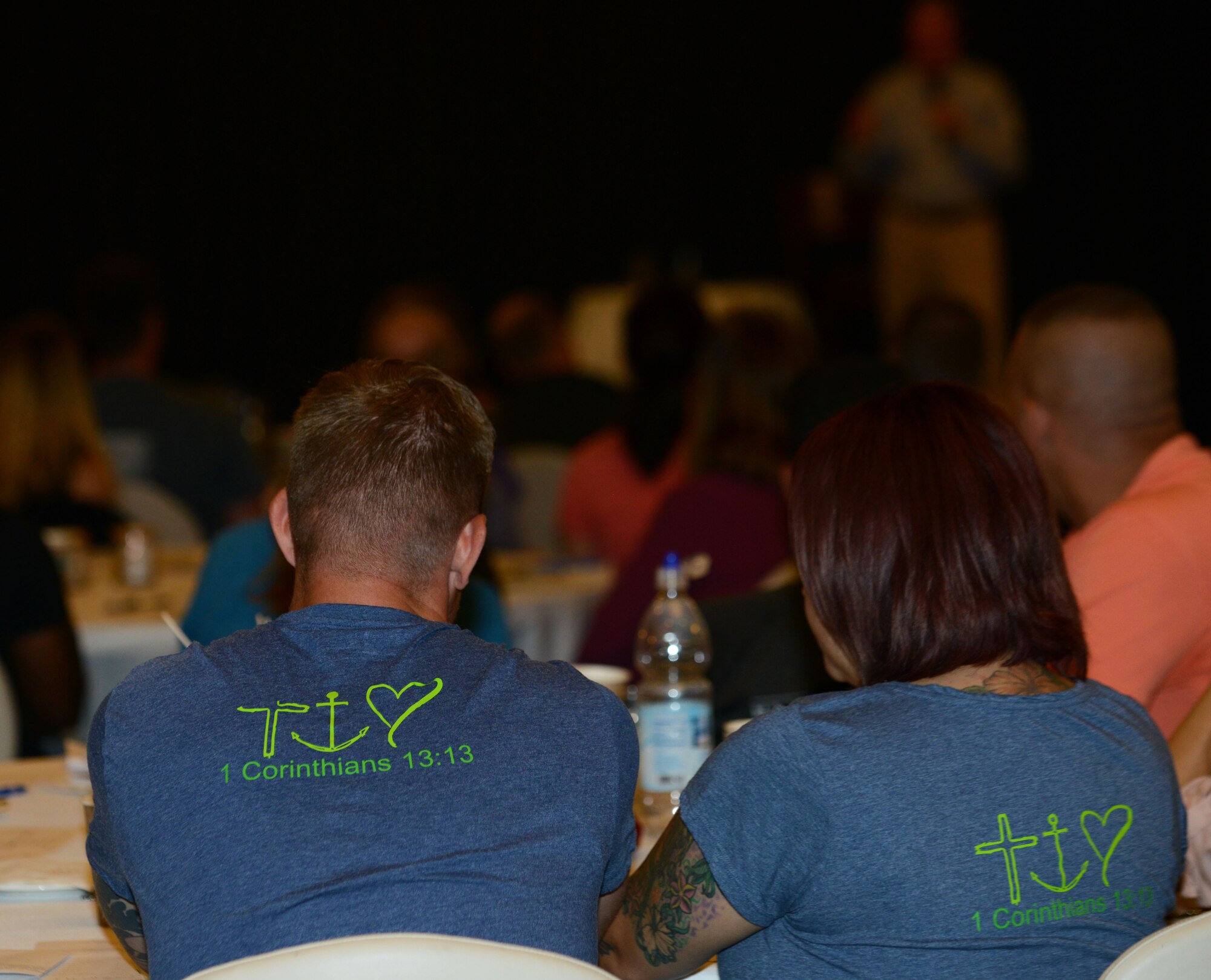 A couple attends a marriage seminar at Ramstein Air Base, Germany, Aug. 6, 2016. Couples from around the Kaiserslautern Military Community came to hear Gary Chapman, marriage counselor and author of “The 5 Love Languages” book series, speak to them about how they can better understand each other while continuing to improve their marriage. (U.S. Air Force photo/ Airman 1st Class Joshua Magbanua)