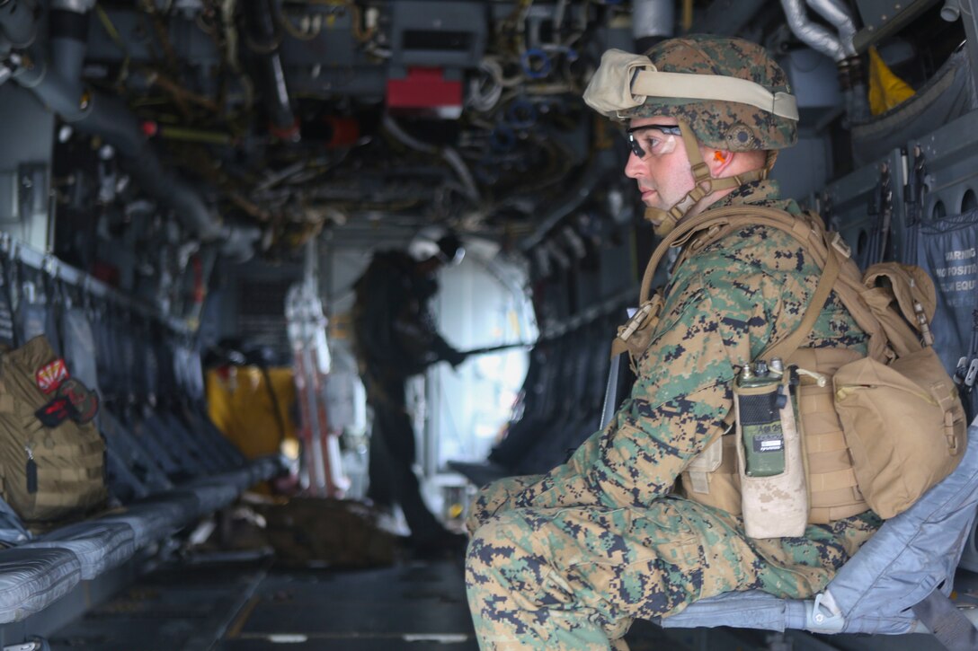 Capt. Christopher Herlihy, a native of Key West, Florida,  waits as a crew chief prepares an MV-22B Osprey to take flight from Clark Air Base in the Philippines in support of Air Assault Support Exercise 16.2, Aug 1, 2016. The goal of AASE 16.2 is to maintain the readiness and interoperability of the U.S. and Armed Forces of the Philippines to ensure an effective and rapid response to any contingency in the region. (Marine Corps Photo by Lance Cpl. Carl King/Released)