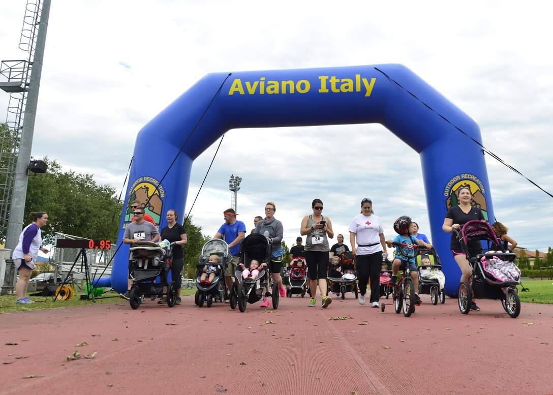 Runners take off during World Breastfeeding Week Family Fun Day 5K run, August 6, 2016, at Aviano Air Base, Italy. The base promoted World Breastfeeding Week with a kickoff ceremony, a meet-and-greet luncheon and an annual coining ceremony. (U.S. Air Force photo by Airman 1st Class Cary Smith/Released)