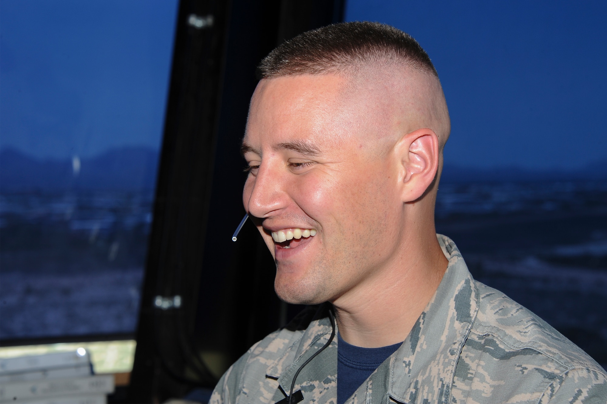 U.S. Air Force Senior Airman Kimo Lagapa-Talbott, 355th Operations Support Squadron air traffic controller, communicates with pilots via radio at Davis-Monthan Air Force Base, Ariz., July 29, 2016. Lagapa-Talbott received the 2015 Air Force Air Traffic Controller of the Year award. (U.S. Air Force photo by Airman 1st Class Mya M. Crosby)