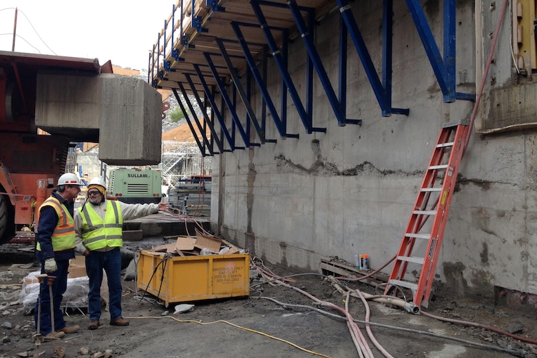 Tony Ellis (Left), Kentucky Lock Addition Project resident engineer, and Jim Niznik, technical lead for the Tennessee Valley Authority, check on the progress of construction of the upstream lock monoliths at the project Nov. 14, 2012. Ellis, 53, passed away July 27, 2016.  Serving on the project since 2000, his leadership and expertise are being recognized for the project's success.