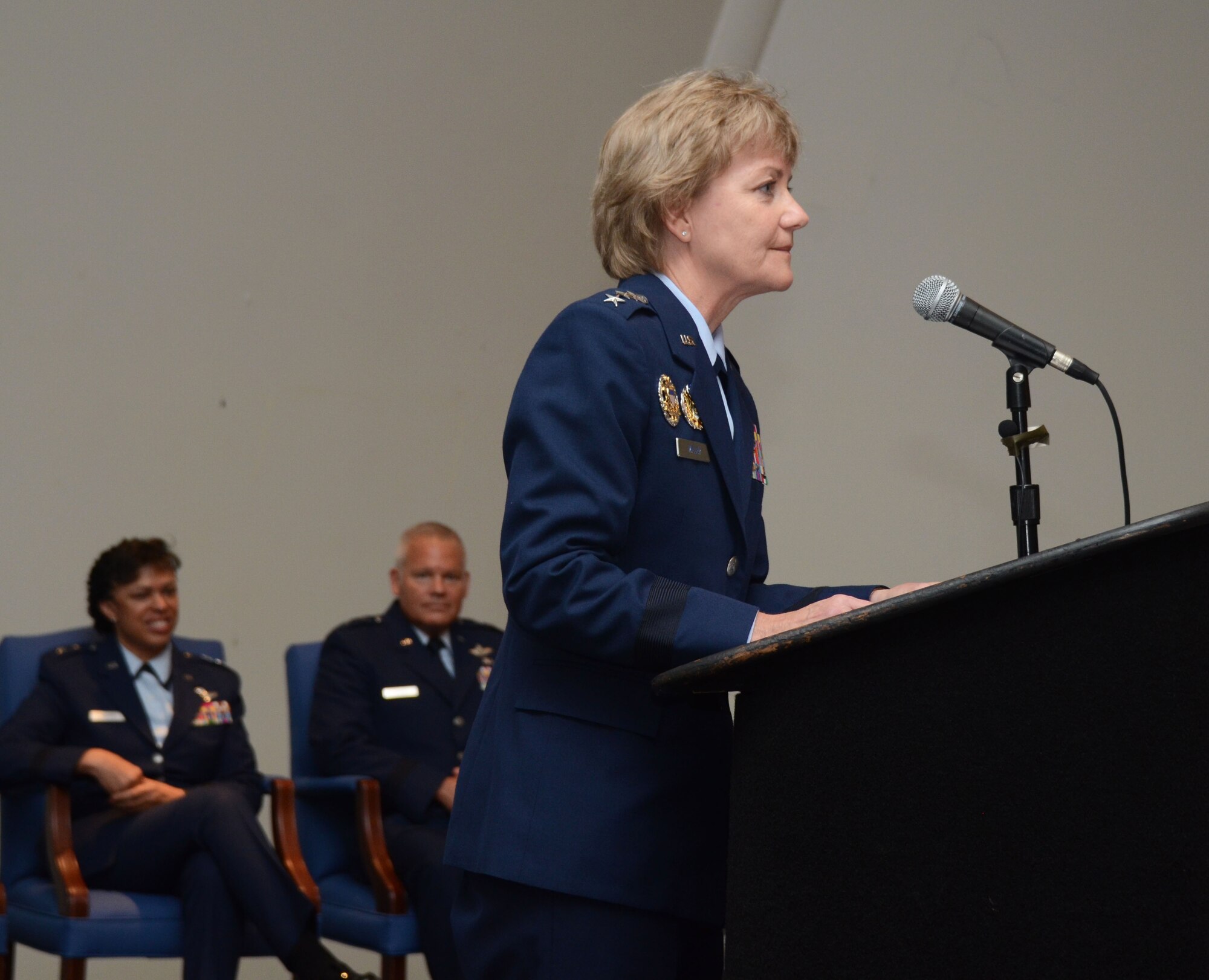 Lt. Gen. Maryanne Miller, Chief of Air Force Reserve, Commander Air Force Reserve Command, highlights former 22nd Air Force commander Maj. Gen. Stayce Harris’ distinguished career, and thanks her for her commitment to the Airmen of the 22 AF for the past two years during the a change of command ceremony in Atlanta, Ga., on Aug. 8, 2016. Harris relinquished command of the 22nd Air Force to Maj. Gen. John Stokes. (U.S. Air Force photo/Don Peek)