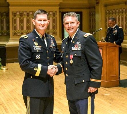 Upon his departure as the Pittsburgh District commander, Col. Bernard R. Lindstrom receives the Legion of Merit Award from Maj. Gen.  Donald E. (Ed) Jackson, Jr., July 29.