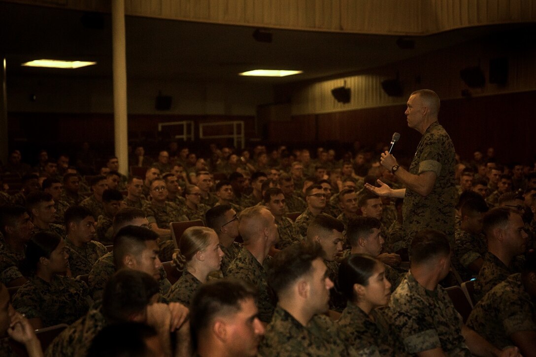 Navy Lt. Cmdr. David L. Duprey, a chaplain with Marine Raider Support Group, speaks to Marines with 8th Communication Battalion, during a special readiness evolution at Camp Lejeune, N.C., August 3, 2016. Through personal anecdotes and visual demonstrations, Duprey conveyed the importance of building moral support throughout the unit to maintain operational readiness. (U.S. Marine Corps photo by Pfc. Juan Soto-Delgado)