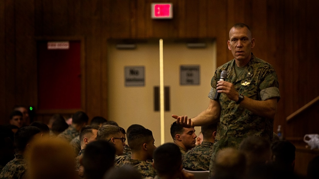 Navy Lt. Cmdr.  David L. Duprey, a chaplain with the Marine Raider Support Group, speaks during a special readiness evolution at Camp Lejeune, N.C., August 3, 2016. Duprey discussed suicide prevention to Marines of 8th Communication Battalion as a means to maintain unit operational readiness.  (U.S. Marine Corps photo by Pfc. Juan Soto-Delgado)