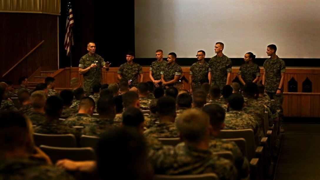 Navy Lt. Cmdr. David L. Duprey, left, a chaplain with the Marine Raider Support Group, demonstrates different levels of stress using several Marines from 8th Communication Battalion during a special readiness evolution at Camp Lejeune, N.C., August 3, 2016. Duprey, talked to the audience about the importance of intervening in the early stages of stress in order to mitigate future potential related issues. (U.S. Marine Corps photo by Pfc. Juan Soto-Delgado)