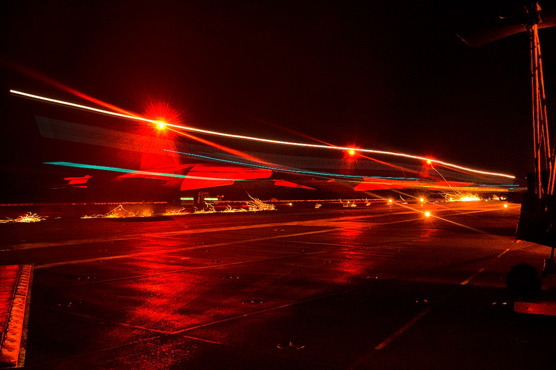 A Navy F/A-18E Super Hornet assigned to Strike Fighter Squadron 192 makes an arrested landing during night operations on the flight deck of the aircraft carrier USS Carl Vinson in the Pacific Ocean, Aug. 5, 2016. Navy photo by Petty Officer 2nd Class D’Andre L. Roden