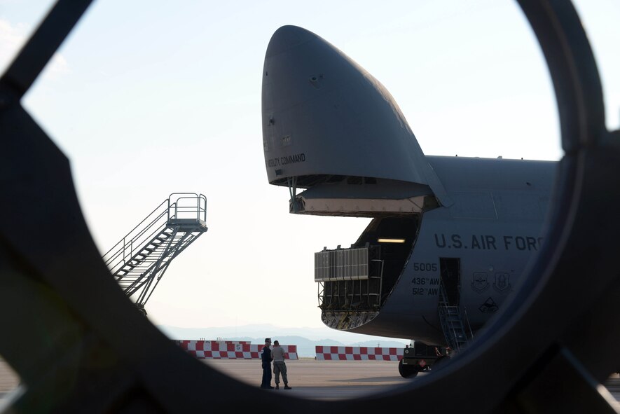 A U.S. Air Force C-5 Galaxy assigned to Dover Air Force Base (AFB), Del., arrives at Ellsworth AFB, S.D., Aug. 2, 2016. The C-5 transported equipment from Ellsworth AFB to Andersen AFB, Guam, in support of U.S. Pacific Command’s continuous bomber presence mission. (U.S. Air Force photo by Airman Donald Knechtel) 