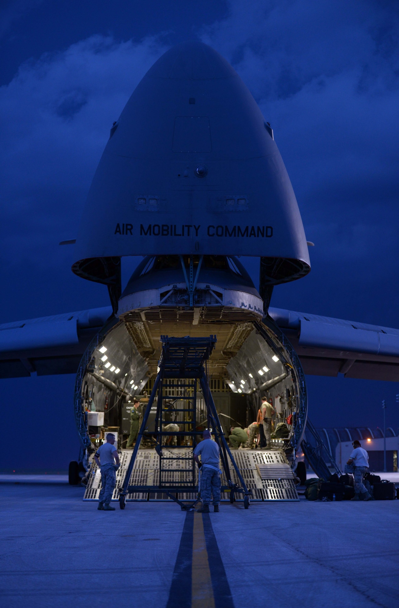 A C-5 Galaxy assigned to Dover Air Force Base (AFB), Del., arrives at Ellsworth AFB, S.D., Aug. 2, 2016. The C-5 has 12 internal wing tanks with a total fuel capacity of 51,150 gallons, has a cargo load of 270,000 pounds and can fly 2,150 nautical miles, offload, and fly to a second base 500 nautical miles away from the original destination. (U.S. Air Force photo by Airman Donald Knechtel) 