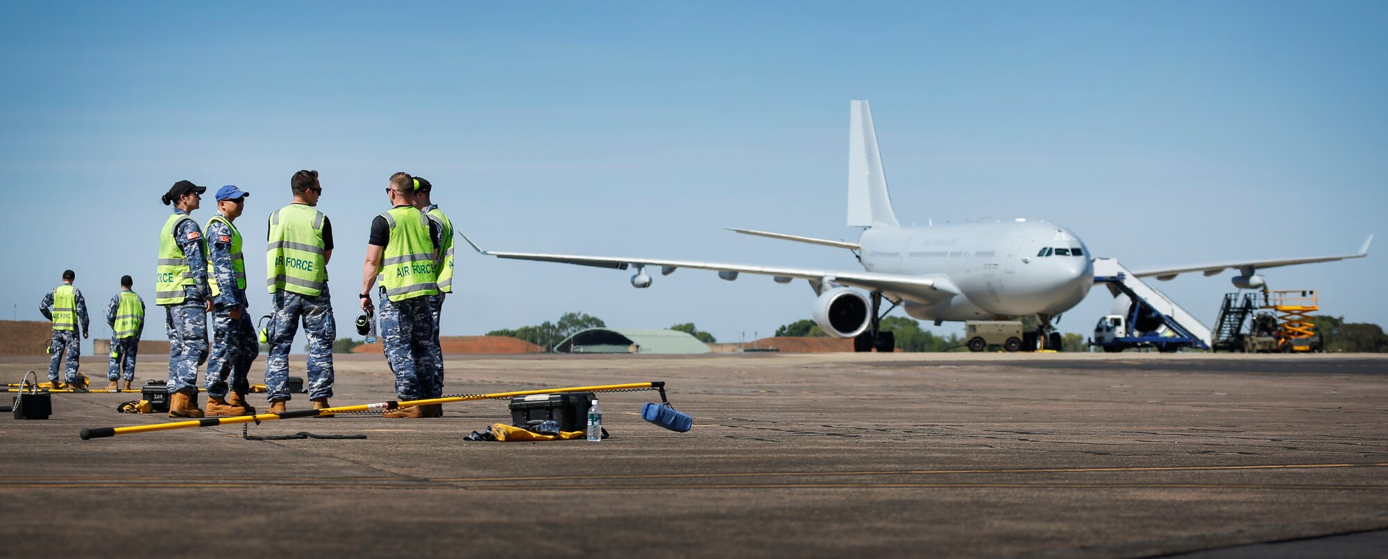 Royal Australian Air Force (RAAF) duty crew oversee the arrival of a KC-30A Multi Role Tanker Transport aircraft from Number 33 Squadron during Exercise PITCH BLACK 2016 (PB16) at RAAF Base Darwin, Australia, July 27, 2016.  PB16 is the RAAF's largest and most complex exercise in 2016. This year's exercise features up to 2,500 personnel and 115 aircraft from participating nations including Australia, Canada, French (New Caledonia), Germany, Indonesia, Netherlands, New Zealand, Singapore, Thailand and the United States. (Australian Defence Force photo by CPL Casey Gaul) 