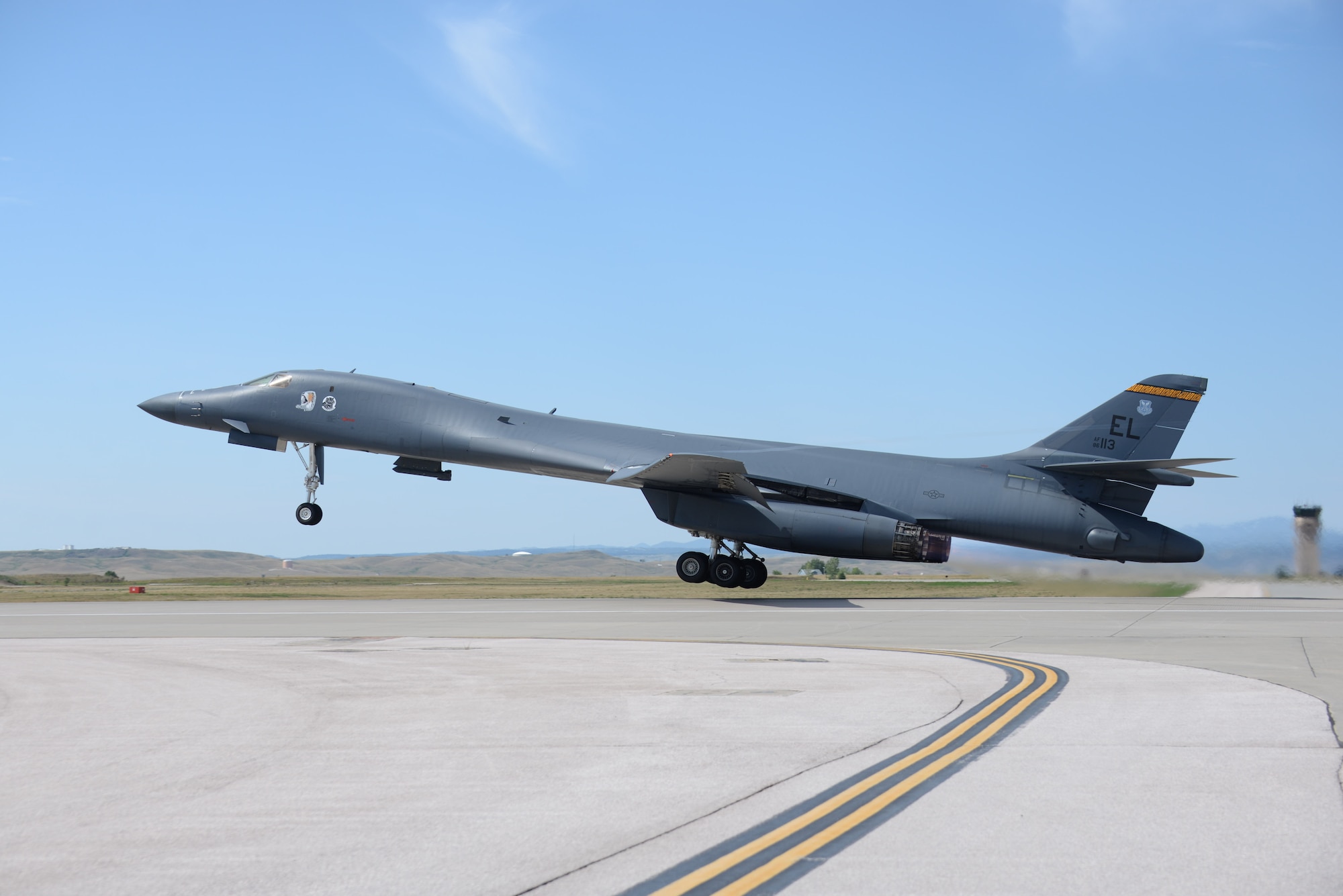 A B-1 bomber departs at Ellsworth Air Force Base (AFB), S.D., Aug. 5, 2016, as part of a deployment to Andersen AFB, Guam. More than 300 Airmen from the 28th Bomb Wing have deployed to Andersen AFB, Guam, in support of U.S. Pacific Command’s continuous bomber presence mission. (U.S. Air Force photo by Airman 1st Class Sadie Colbert)