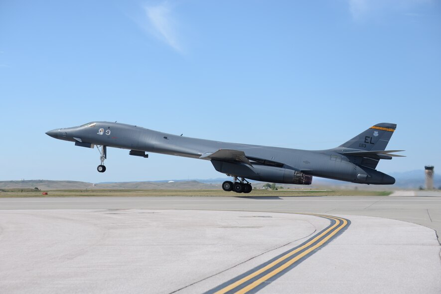 A U.S. Air Force B-1 bomber departs Ellsworth Air Force Base (AFB), S.D., Aug. 5, 2016, as part of a deployment to Andersen AFB, Guam. More than 300 Airmen from the 28th Bomb Wing have deployed to Andersen AFB, Guam, in support of U.S. Pacific Command’s continuous bomber presence mission. (U.S. Air Force photo by Airman 1st Class Sadie Colbert)
