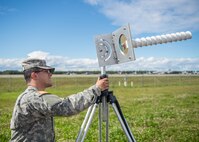 U.S. Army Spc. Angel Mendoza, 4th Space Company, 1st Battalion, 1st Space Brigade, assigned as a space aggressor operator to the 527th Space Aggressor Squadron, Schreiver Air Force Base, Colo., adjusts a helical antenna adjacent to the Eielson Air Force Base, Alaska, flight line Aug. 8, 2016, during RED FLAG-Alaska (RF-A) 16-3. Along with two modems and an amplifier, space aggressors at RF-A 16-3 interrupt GPS systems for navigation, which weapons pilots use during the exercise designed to simulate the first 10 combat sorties of a surge operation or conflict. (U.S. Air Force photo by Staff Sgt. Shawn Nickel)