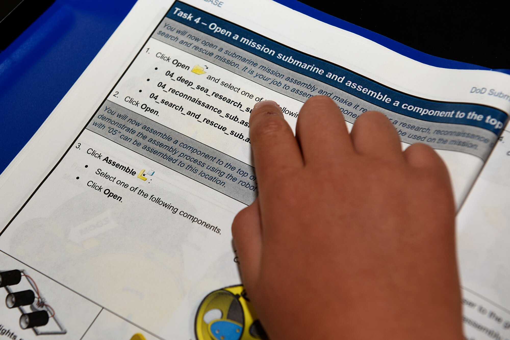 A student of the STEM Camp follows along with the instructions while building a submarine using computer software at Peterson Air Force Base, Colo., Aug. 4, 2016. The camp partnership with the STARBASE Academy and Colorado 4-H brought together students from around the country to learn about science, technology, engineering and mathematics. (U.S. Air Force photo by Senior Airman Rose Gudex)
 
