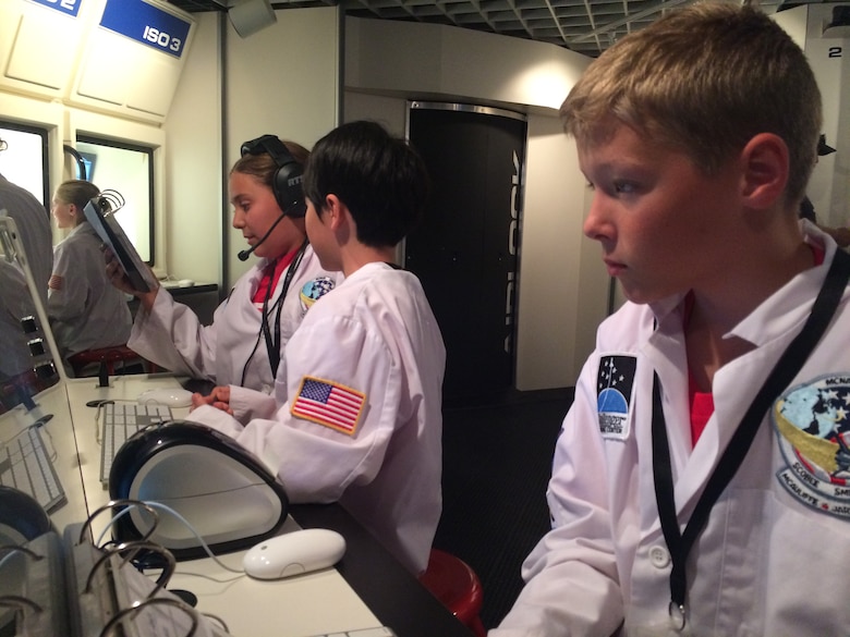 Students participating in the STEM Camp participate in a field trip to Challenger Learning Center for the Voyage to Mars simulation in Colorado Springs, Colo., Aug. 3, 2016. The camp taught the value of design thinking, building confidence with technology through problem solving and individual learning experiences. (Courtesy photo)