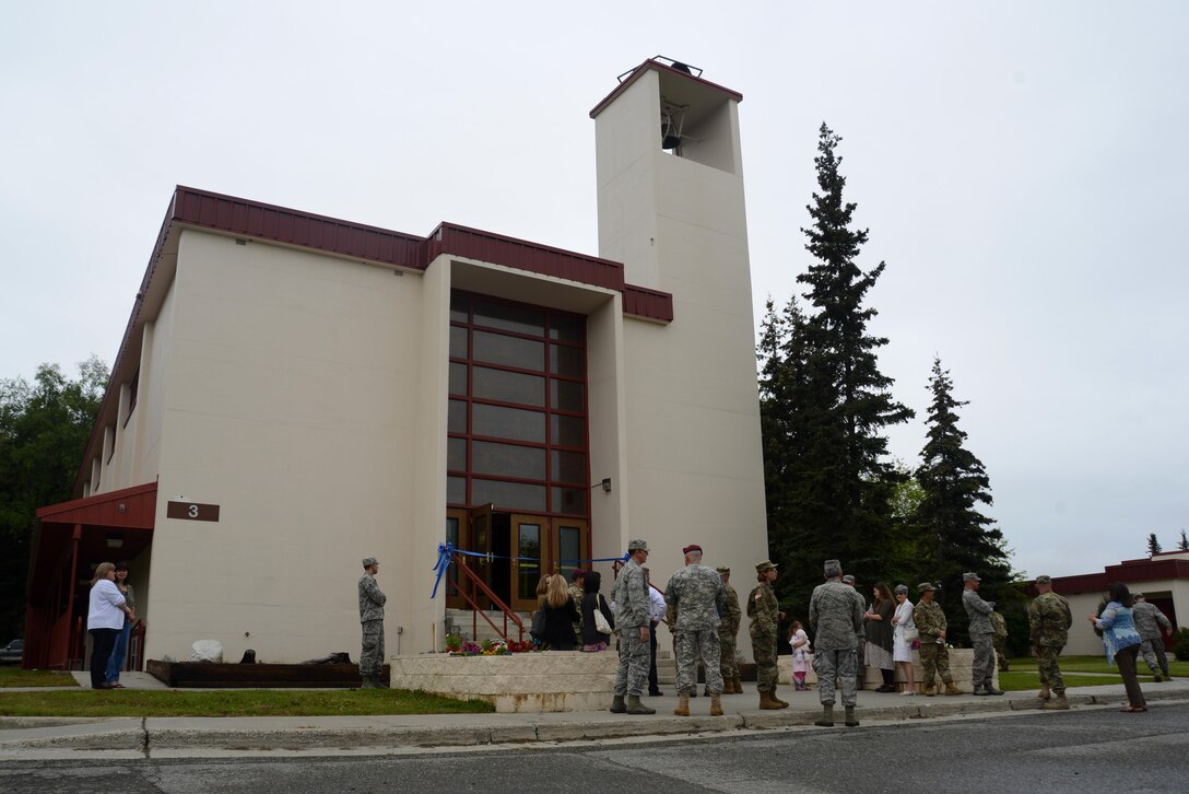 A crowd gathers for the reopening of the Arctic Warrior Chapel at Joint Base Elmendorf-Richardson, Alaska, Aug. 5, 2016. The renovations started in February to improve safety and upgrade the facility to support religious services and military functions. (U.S. Air Force photo by Airman 1st Class Christopher R. Morales)