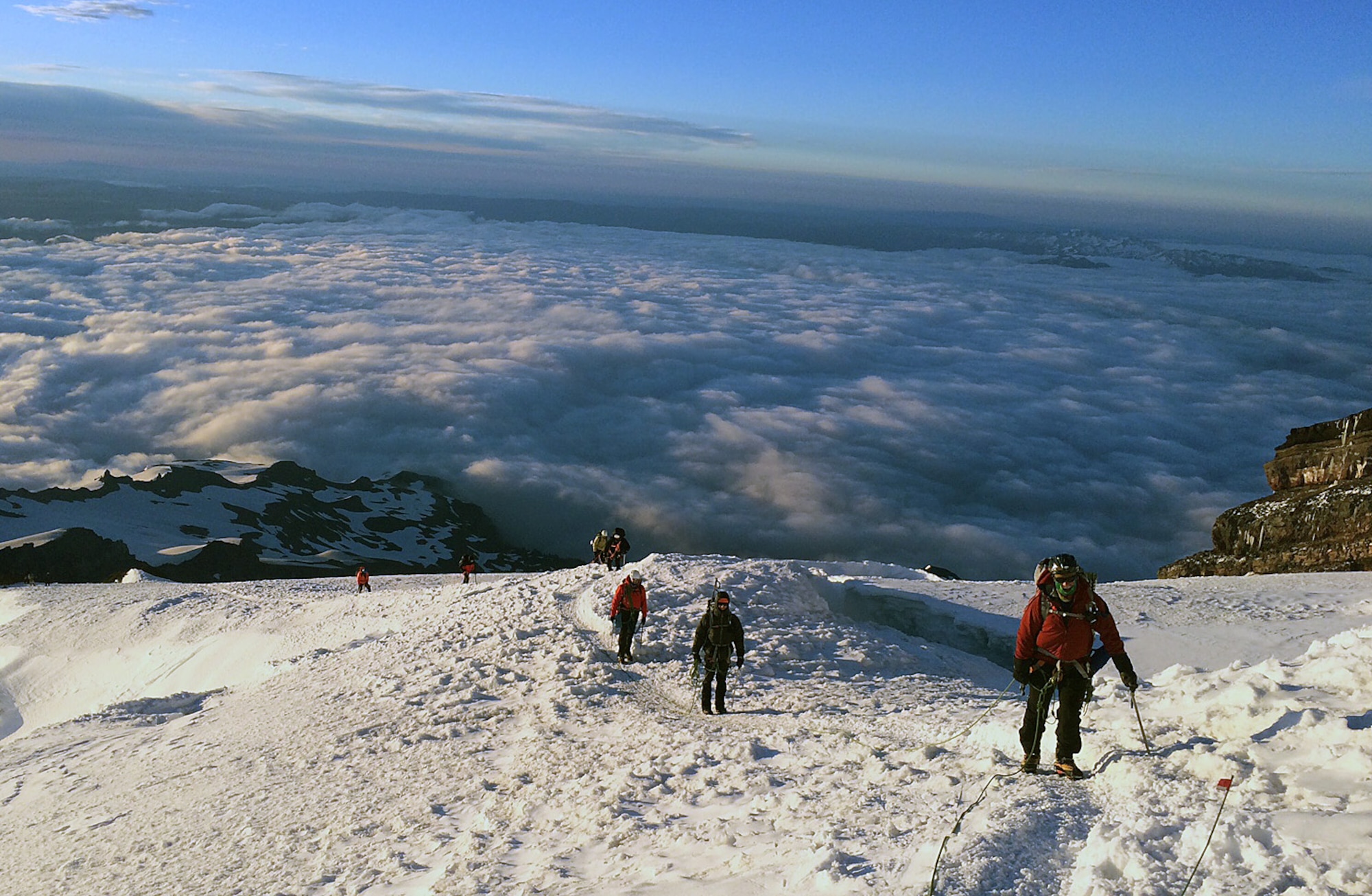 Members of the U.S. Air Force 50 Summits Challenge climb Disappointment Cleaver July 23, 2016 while summiting Mount Rainier, Wash. Standing at 14,411 feet tall, Mount Rainier is the tallest mountain in Washington and one of the 50 summits that was yet to be summited under the 50 Summits Challenge until now. (U.S. Air Force photo/Maj. Rob Marshal)