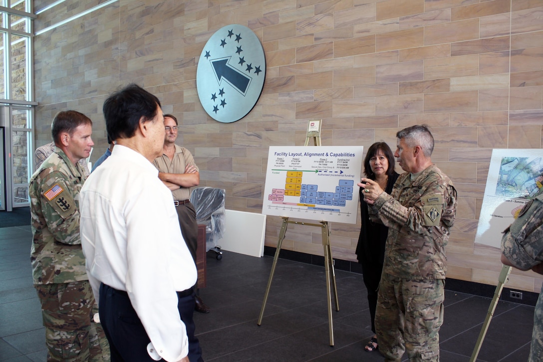 Honolulu District hosted site visits July 12 for the U.S. Army Corps of Engineers Commander Lt. Gen. Todd T. Semonite to our Bldg. 112 renovation and USARPAC Mission Command Facility (MCF) (shown above) at Fort Shafter.  Semonite was briefed on the status of the MCF, which the Corps is building for USARPAC, which will consolidate USARPAC Headquarters into one facility to support Mission Command of Army or joint forces across the Asia-Pacific Area of Operations. The District finished the first contract for the MCF with the successful completion of a central utilities plant, switch building, communications hub, and arrival building. Since the start of the New Year, the District has been moving forward with the second contract that includes construction of administrative and special use spaces, with supporting mechanical, electrical, and telecommunications systems. Semonite was in Hawaii to preside over the Pacific Ocean Division Change of Command ceremony. 
