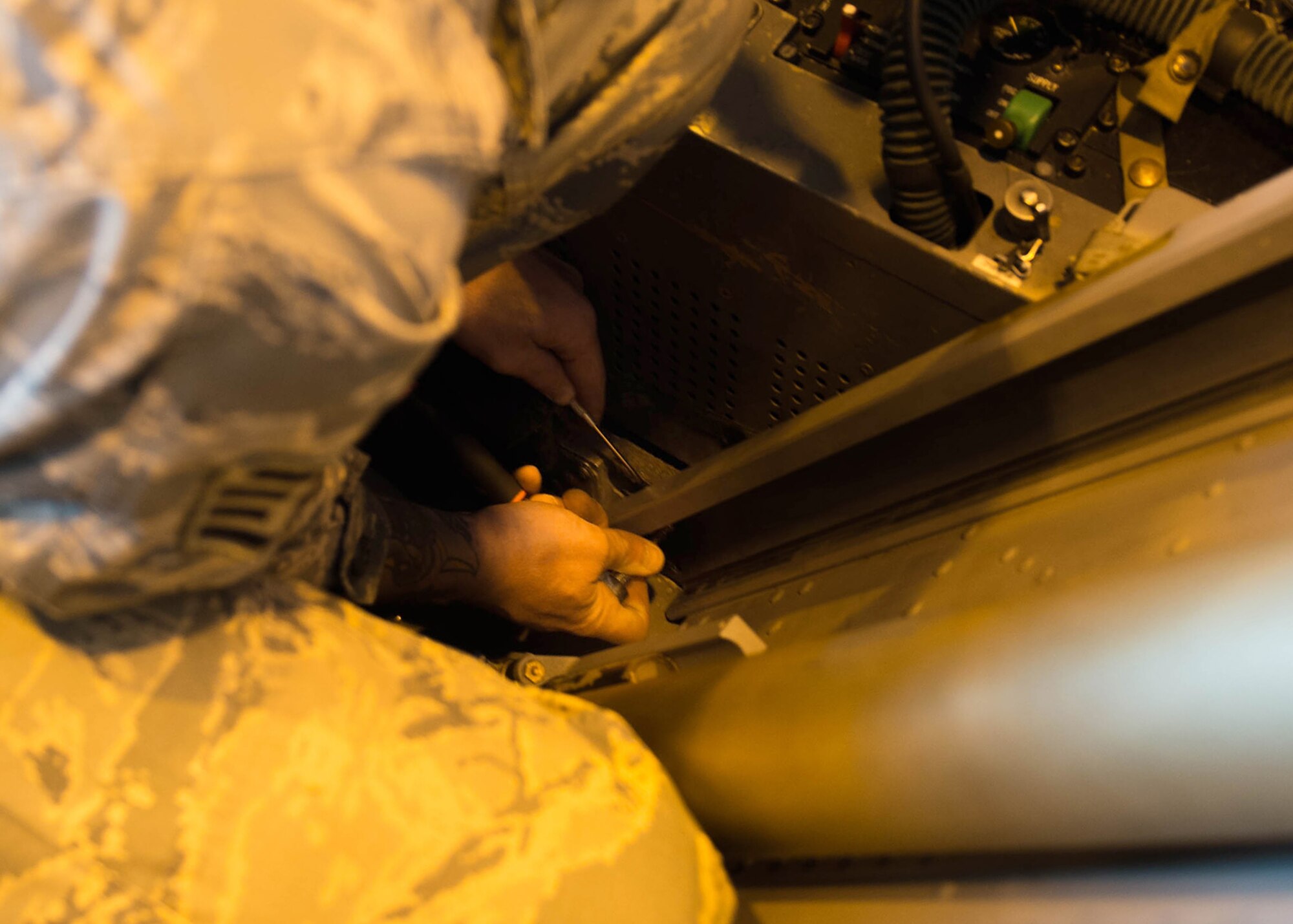 U.S. Air Force Staff Sgt. Shawn Layou, an aircrew egress systems craftsman assigned to the 8th Maintenance Squadron, Kunsan Air Base, Republic of Korea, bolts into place to secure an ejection seat in an F-16D Fighting Falcon aircraft Aug. 9, 2016, during RED FLAG-Alaska 16-3 at Eielson Air Force Base, Alaska. This exercise provides unique opportunities to integrate various forces into joint, coalition and multilateral training from simulated forward operating bases. (U.S. Air Force photo by Staff Sgt. Shawn Nickel)
