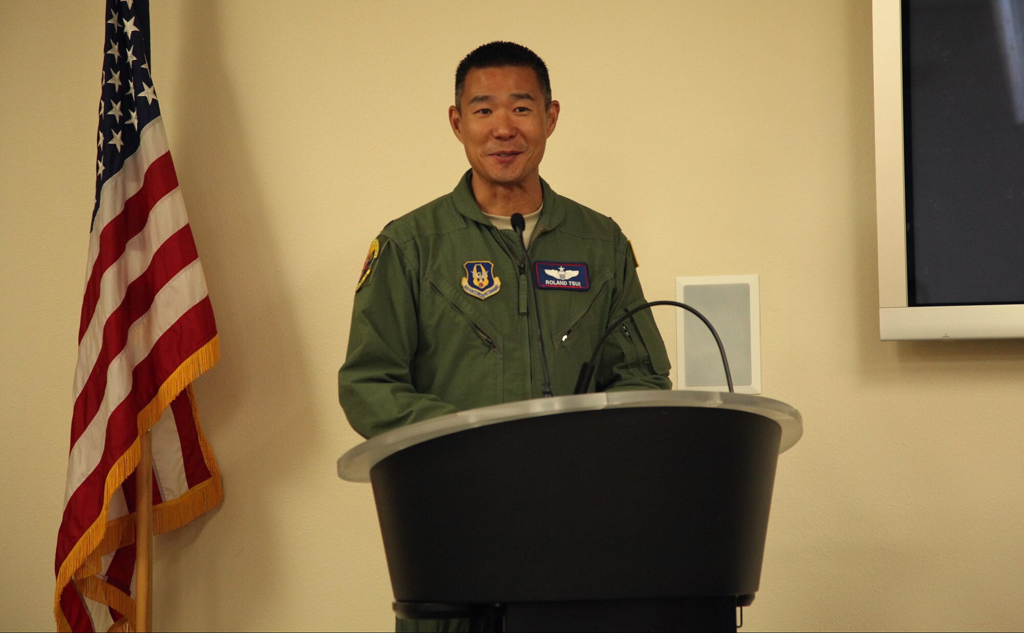 Lt. Col. Rolland Tsui, 314th Air Refueling Squadron commander, addresses the audience August 6, 2016, during the squadron’s assumption of command ceremony at Beale Air Force Base, California. Tsui’s squadron’s mission it to provide air refueling for Air Force aircraft. (U.S. Air Force photo by Tech. Sgt. Kenneth McCann/Released)