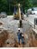 AEDC Pipe Shop supervisor Kerry Abbott checks the dimensions of the fire protection line before fabricating a replacement pipe. The pipe failed after the start of a base wide water outage in early July and the job was worked into an ongoing heavy maintenance schedule. (AEDC photo)