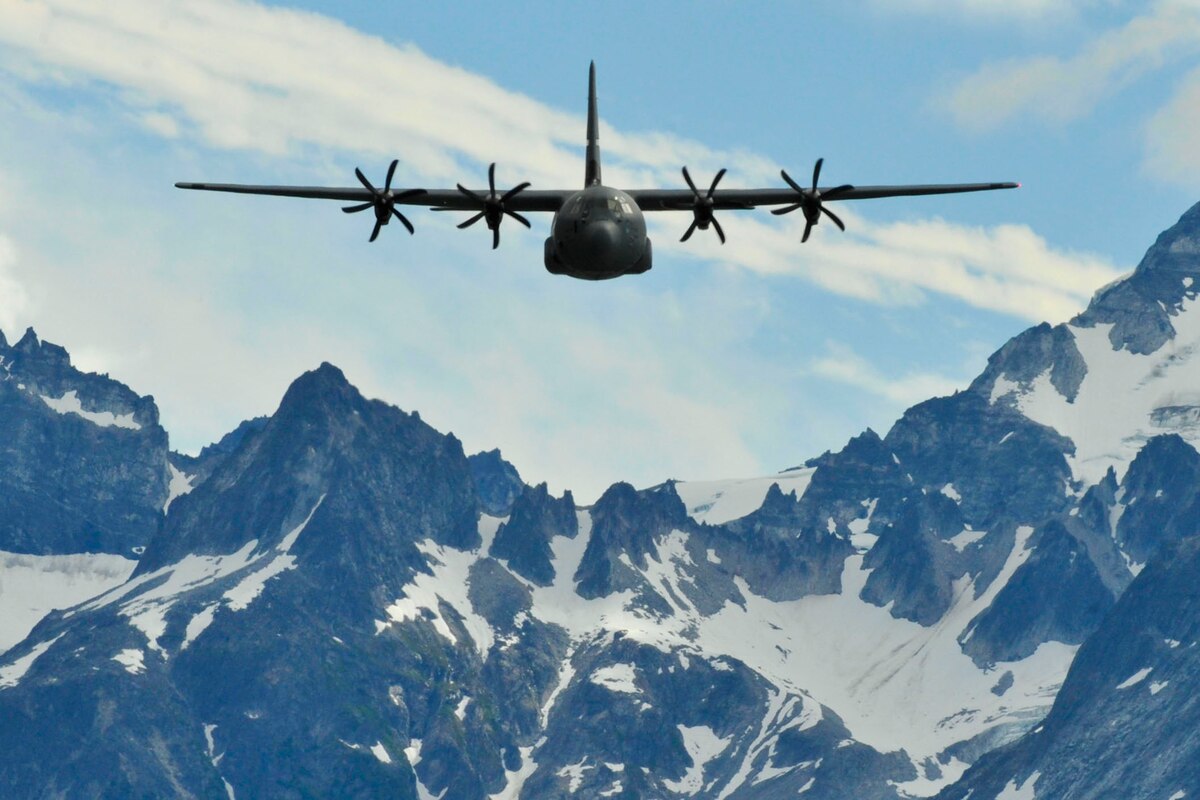 A C-130J assigned to the 41st Airlift Squadron at Little Rock Air Force Base performs low-level training through the Alaskan mountains July 21, 2016. (U.S. Air Force photo by Senior Airman Stephanie Serrano)