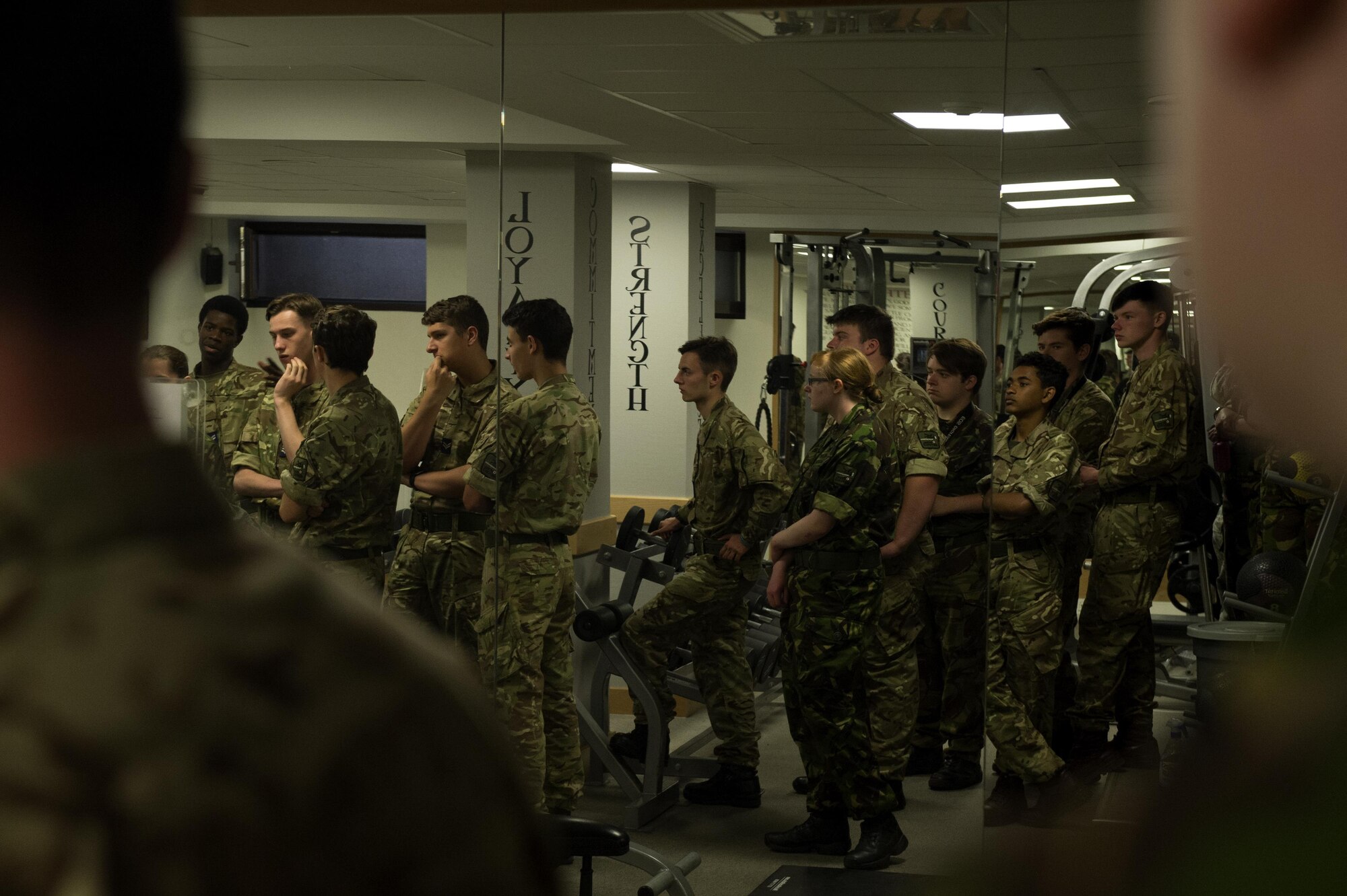 Members of Air Cadets, a United Kingdom-wide youth group sponsored by the Royal Air Force, received a guided tour of the 52nd Civil Engineer Squadron fire department’s gym during a visit to Spangdahlem Air Base, Germany, Aug. 9, 2016. Air Cadets receive opportunities to travel in Europe and abroad to many areas including military installations, museums and other various sites while aiming to develop qualities of leadership and good citizenship. (U.S. Air Force photo by Airman 1st Class Preston Cherry/Released)