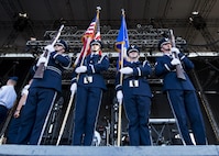 The Honor Guard from Grand Forks Air Force Base, N.D., presents the colors during an Air Force Delayed Entry Program swearing in ceremony in Detroit Lakes, Minn., Aug. 5, 2016. The ceremony concluded with the national anthem and a fly over performed by a 5th Bomb Wing B-52H Stratofortress. (U.S. Air Force photo/Airman 1st Class J.T. Armstrong)