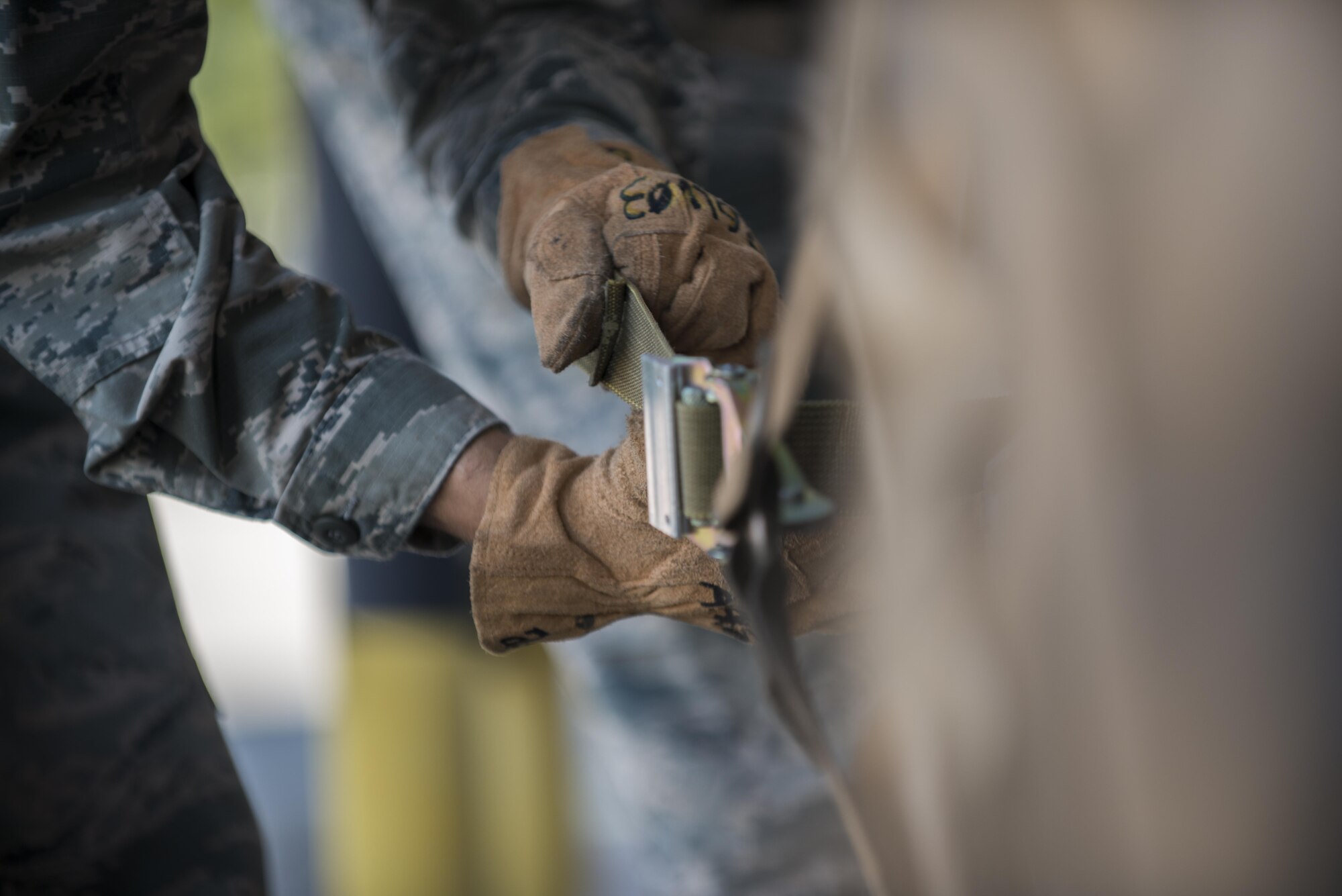 Senior Airmen Cameron Jones, 31st Maintenance Squadron phase inspection team member, participates in a cargo preparation and pallet build-up training, Aug. 8, 2016, at Aviano Air Base, Italy. The training instructed Airmen how to properly assemble and disassemble cargo pallets. (U.S. Air Force photo by Airman 1st Class Cory W. Bush/Released)