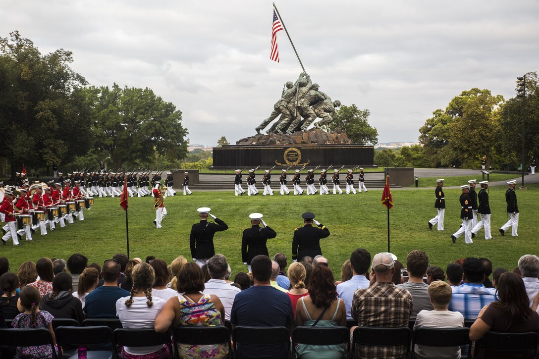 Marines of Marine Barracks Washington, D.C., perform pass in review during the Sunset Parade at Arlington, Va., Aug. 9, 2016. The guest of honor for the parade was Gen. Mark A. Milley, chief of staff for the U.S. Army, and the hosting official was Gen. Robert B. Neller, commandant of the Marine Corps. (Official Marine Corps photo by Lance Cpl. Robert Knapp/Released)
