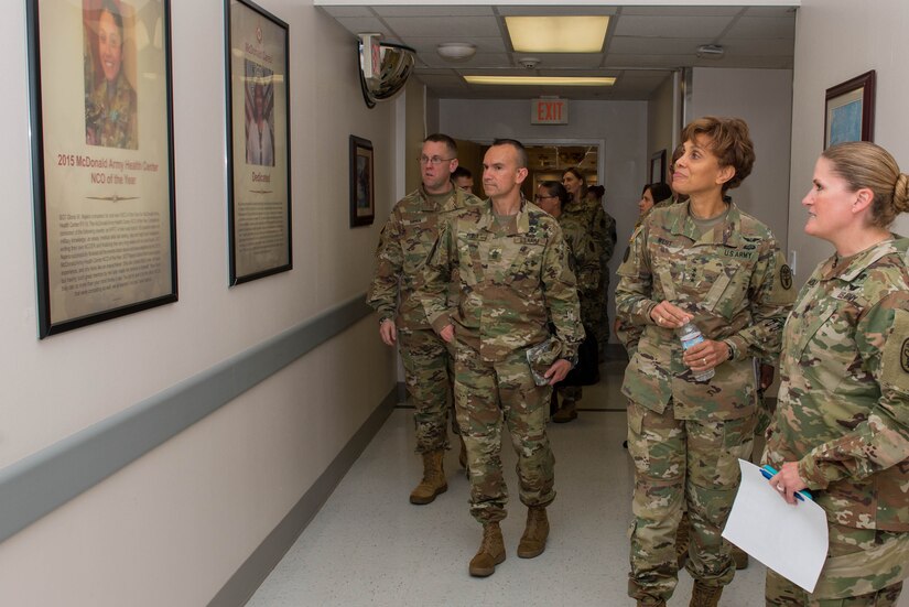 U.S. Army Lt. Gen. Nadja West, U.S. Army Medical Command surgeon general, tours the Hall of Honor in McDonald Health Center at Fort Eustis, Va., Aug. 4, 2016. The Hall of Honor is represented by McDonald Health Center professionals who exceed the health center’s standards. (U.S. Air Force photo by Airman 1st Class Derek Seifert)