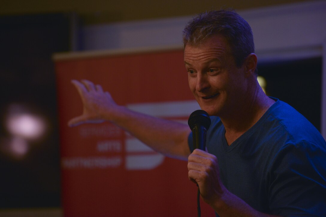 PJ Walsh, comedian, performs during a comedy show at Fort Eustis, Va., August 5, 2016. Walsh is a U.S. Navy veteran who now is a professional stand-up comedian, and has performed more than 20 overseas tours for U.S. troops in several countries including Iraq and Afghanistan. (U.S. Air Force photo by Staff Sgt. Natasha Stannard)