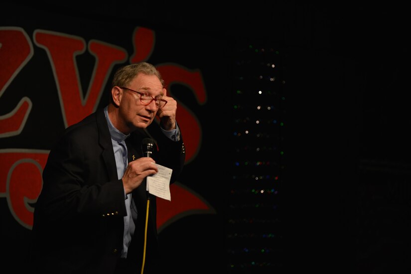 Retired U.S. Army Chaplain (Lt. Col.) James King performs his comedy routine at a local comedy club in Newport News, Va., April 14, 2016. King started doing comedy through the Armed Service Arts Partnership, a program that aids struggling veterans through teaching them arts, as a way to deal with the stressors in his life. (U.S. Air Force photo by Staff Sgt. Natasha Stannard)